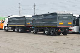 СпецАвтоКам 83703G прицеп бортовой зерновоный 30м3 пневмо подвеска