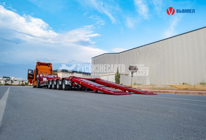 Купить Полуприцеп трал KOMODO KMD4L раздвижной 4 оси г/п 58 400 кг в компании Русбизнесавто - изображение 1