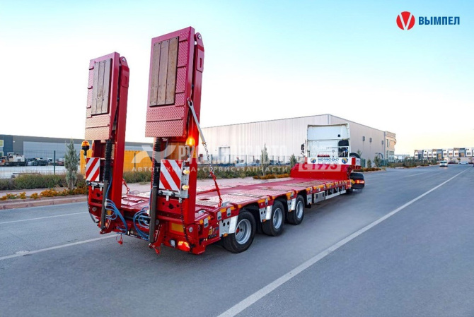 Купить Полуприцеп трал KOMODO KMD3L раздвижной 3 оси г/п 47 800 кг в компании Русбизнесавто - изображение 5